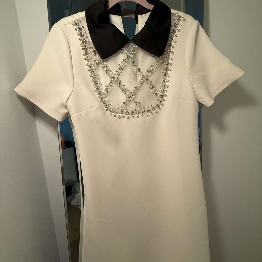 Chic Cream Mini Dress with Black Collar